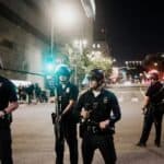 white police officers in riot gear